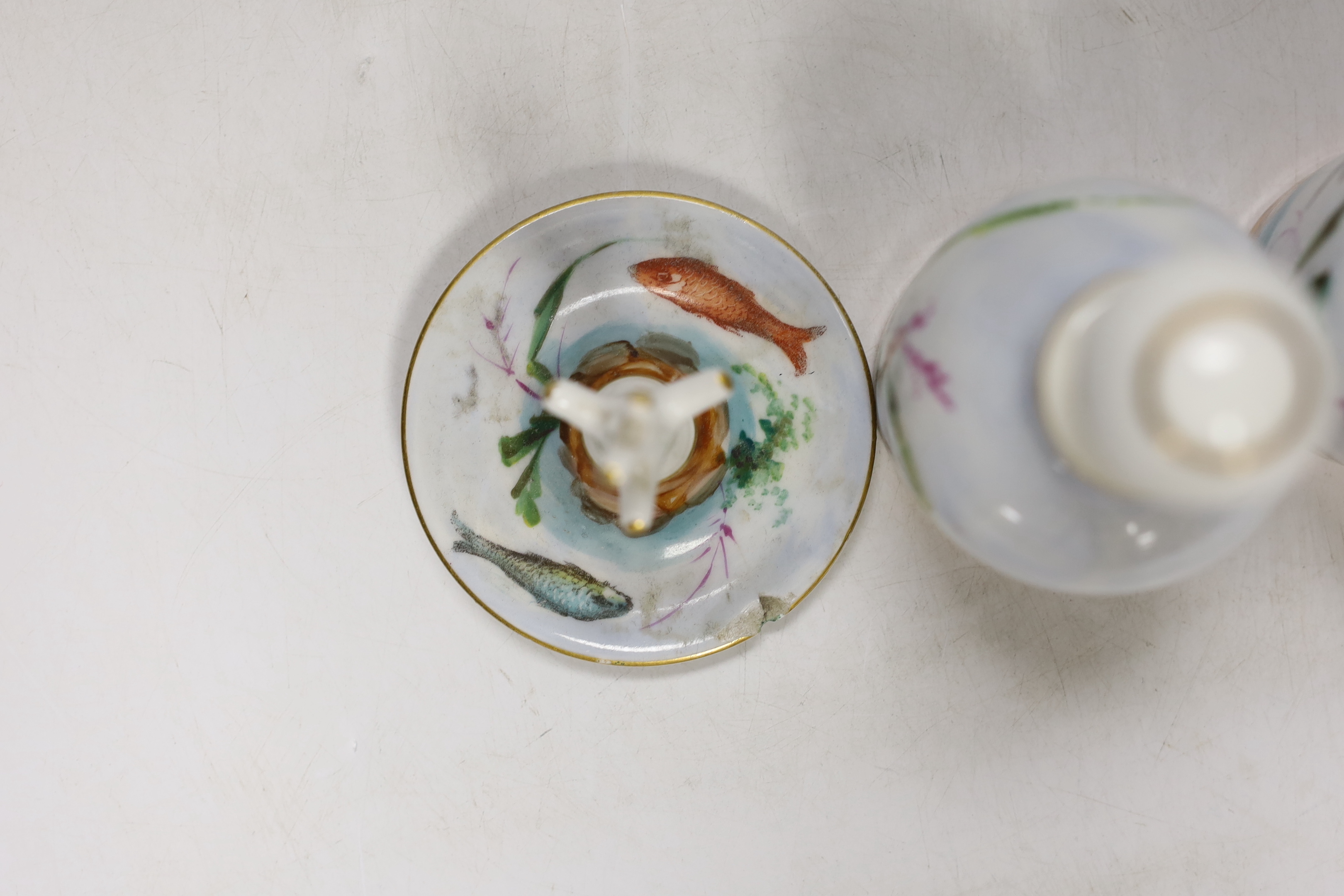 A fish and gilt decorated eight piece dressing table set, two glass scent bottles, two Halcyon Days pots and a Worcester plate, plate 25cm high